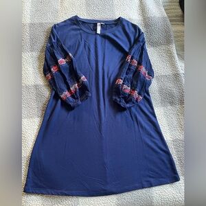Alya (purchased from Francesca’s) blue dress with decorative sleeves. Size M